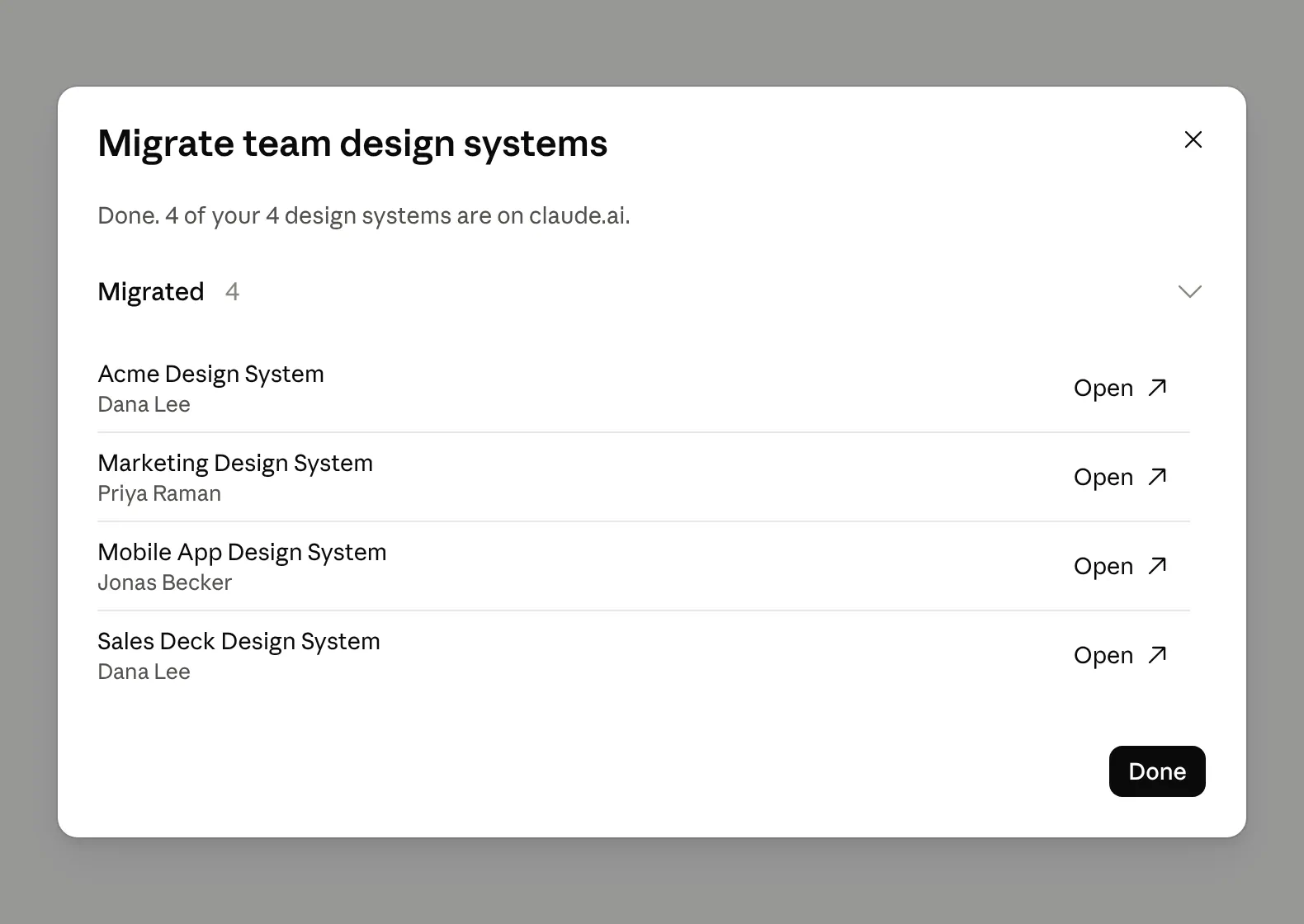The finished window. It says "Done. 4 of your 4 design systems are on claude.ai." and lists four migrated design systems, each with its owner's name and an "Open" link.