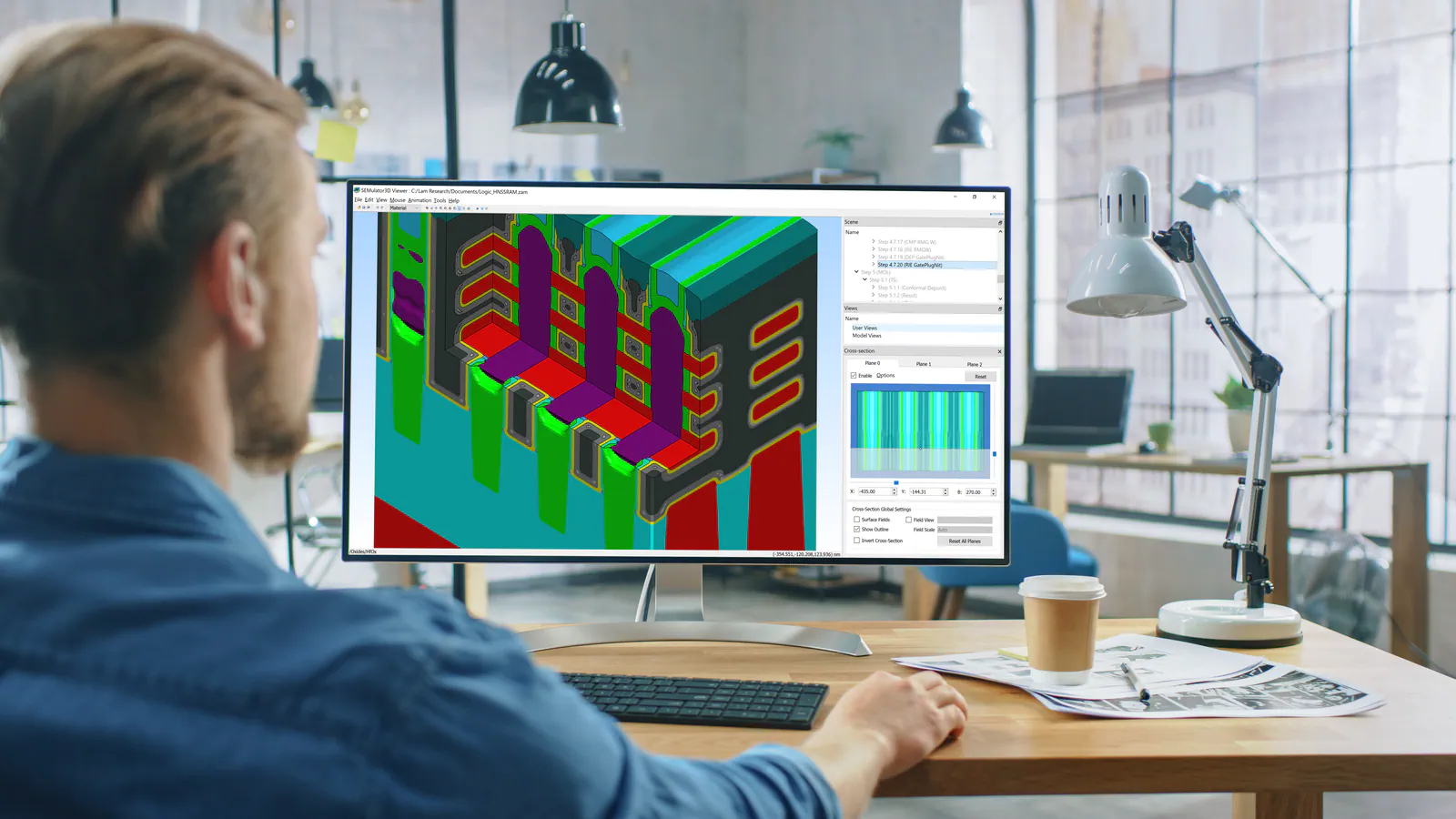 A SEMulator3D interface or simulation result showing a voxel-based three-dimensional semiconductor structure produced by virtual fabrication steps, with visible etched features or material layers.