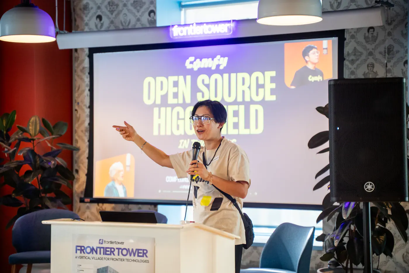 A speaker presenting the Open Source Higgsfield challenge